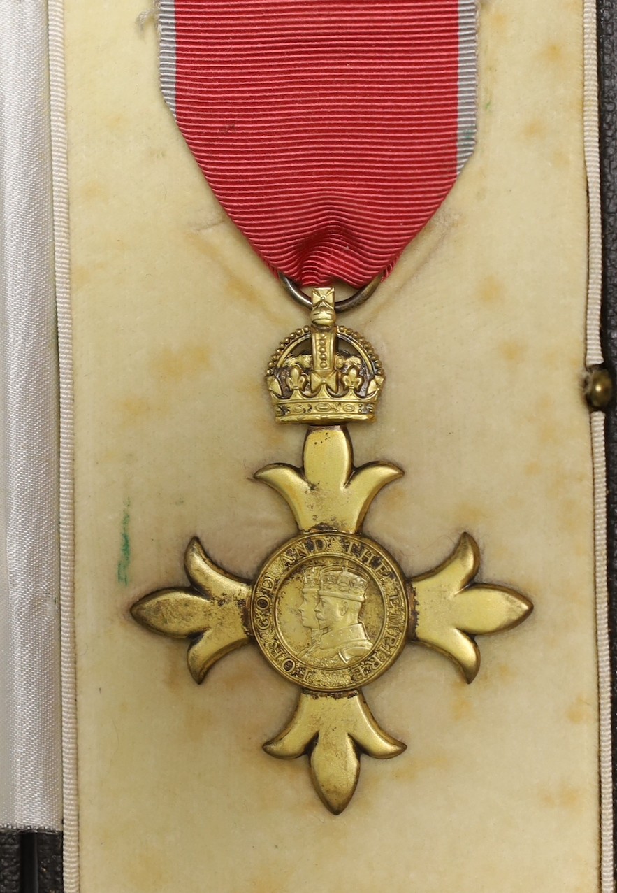 An OBE given to Edward Wilmot Morgan for his services in Hong Kong supplying mains water from Red China to Hong Kong.